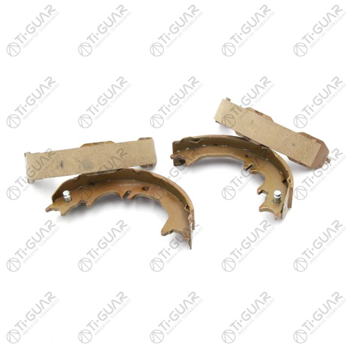 Тормозные колодки (КОМПЛЕКТ 4шт/РУЧНОГО ТОРМОЗА) TG-46540-60060/FN0642* Ti·GUAR